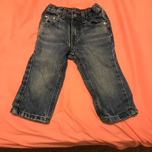 Jeans and Onesies sold as set.